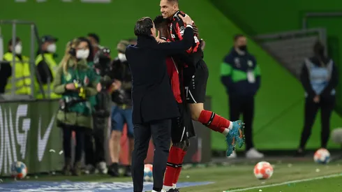 WOLFSBURG, GERMANY – MARCH 20: Paulinho of Bayer 04 Leverkusen celebrates after scoring their side's first goal during the Bundesliga match between VfL Wolfsburg and Bayer 04 Leverkusen at Volkswagen Arena on March 20, 2022 in Wolfsburg, Germany. (Photo by Stuart Franklin/Getty Images)