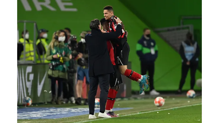 WOLFSBURG, GERMANY - MARCH 20: Paulinho of Bayer 04 Leverkusen celebrates after scoring their side's first goal during the Bundesliga match between VfL Wolfsburg and Bayer 04 Leverkusen at Volkswagen Arena on March 20, 2022 in Wolfsburg, Germany. (Photo by Stuart Franklin/Getty Images)
