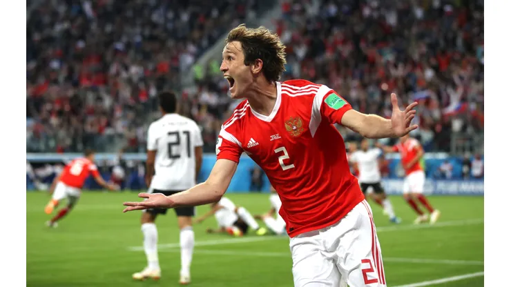 SAINT PETERSBURG, RUSSIA - JUNE 19: Mario Fernandes of Russia celebrates the 2nd Russia goal scored by Denis Cheryshev of Russia during the 2018 FIFA World Cup Russia group A match between Russia and Egypt at Saint Petersburg Stadium on June 19, 2018 in Saint Petersburg, Russia. (Photo by Julian Finney/Getty Images)