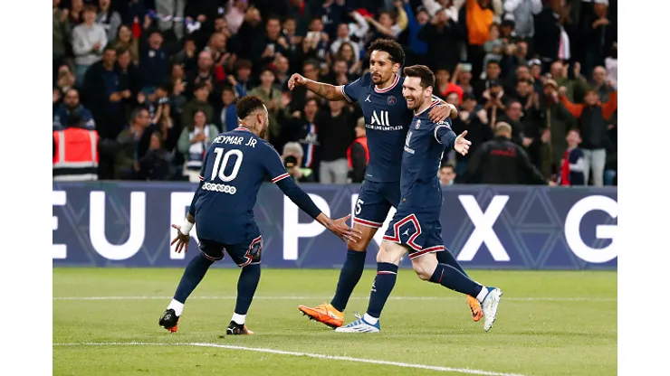 PARIS, FRANCE - APRIL 23: Lionel Messi #30 of Paris Saint-Germain celebrates his goal with Marquinhos #5 of Paris Saint-Germain and Neymar Jr #10 of Paris Saint-Germain during the Ligue 1 Uber Eats match between Paris Saint Germain and RC Lens at Parc des Princes on April 23, 2022 in Paris, France. (Photo by Catherine Steenkeste/Getty Images)