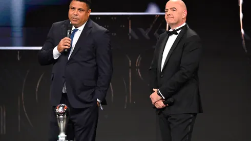 PARIS, FRANCE – FEBRUARY 27: Ronaldo speaks to the audience as Gianni Infantino, President of FIFA looks on during The Best FIFA Football Awards 2022 on February 27, 2023 in Paris, France. (Photo by Aurelien Meunier/Getty Images)