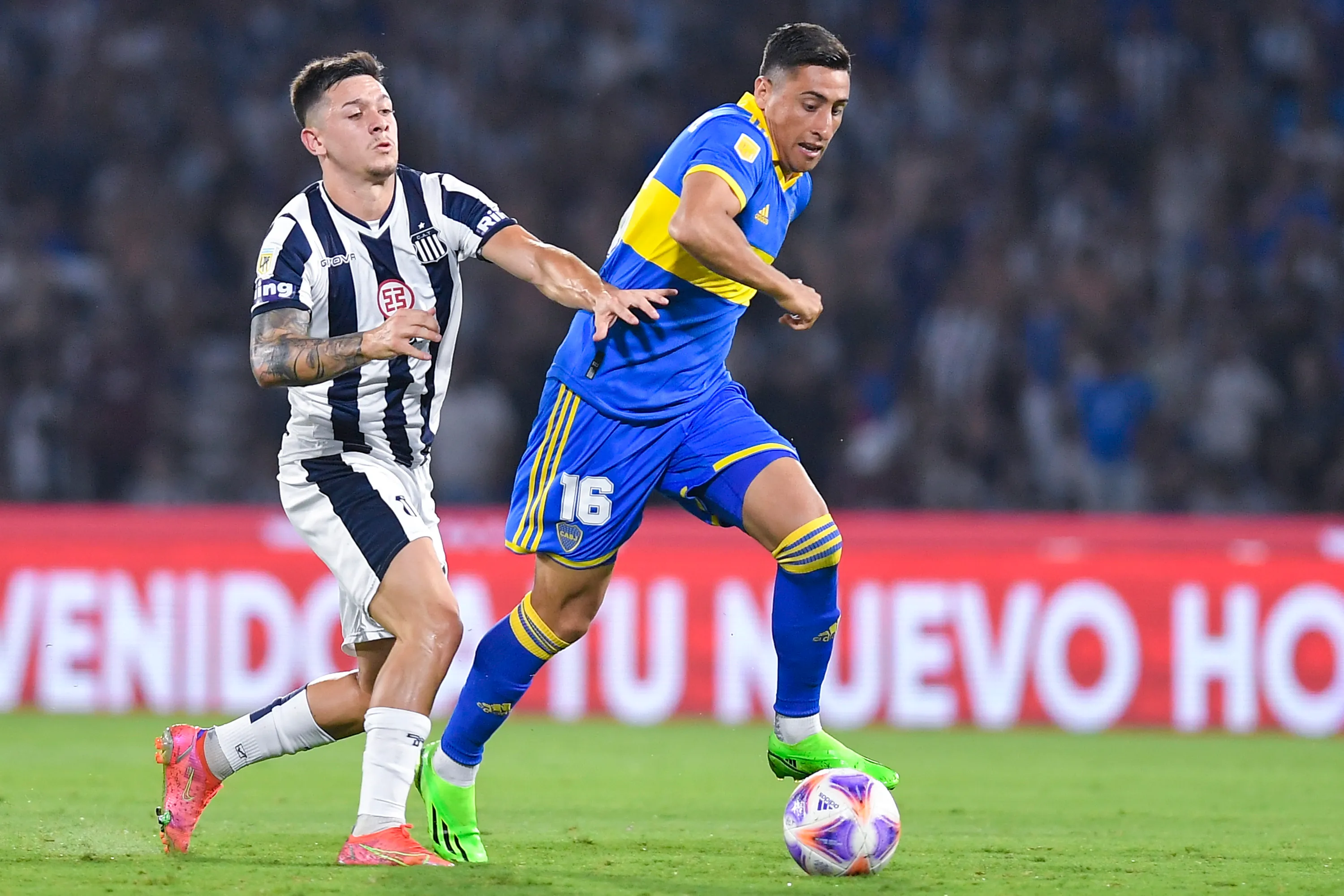 CORDOBA, ARGENTINA – FEBRUARY 11: Miguel Merentiel of Boca Juniors and Rodrigo Garro of Talleres fight for the ball during a match of Liga Profesional 2023 between Talleres and Boca Juniors at Mario Alberto Kempes Stadium on February 11, 2023 in Cordoba, Argentina. (Photo by Hernan Cortez/Getty Images)