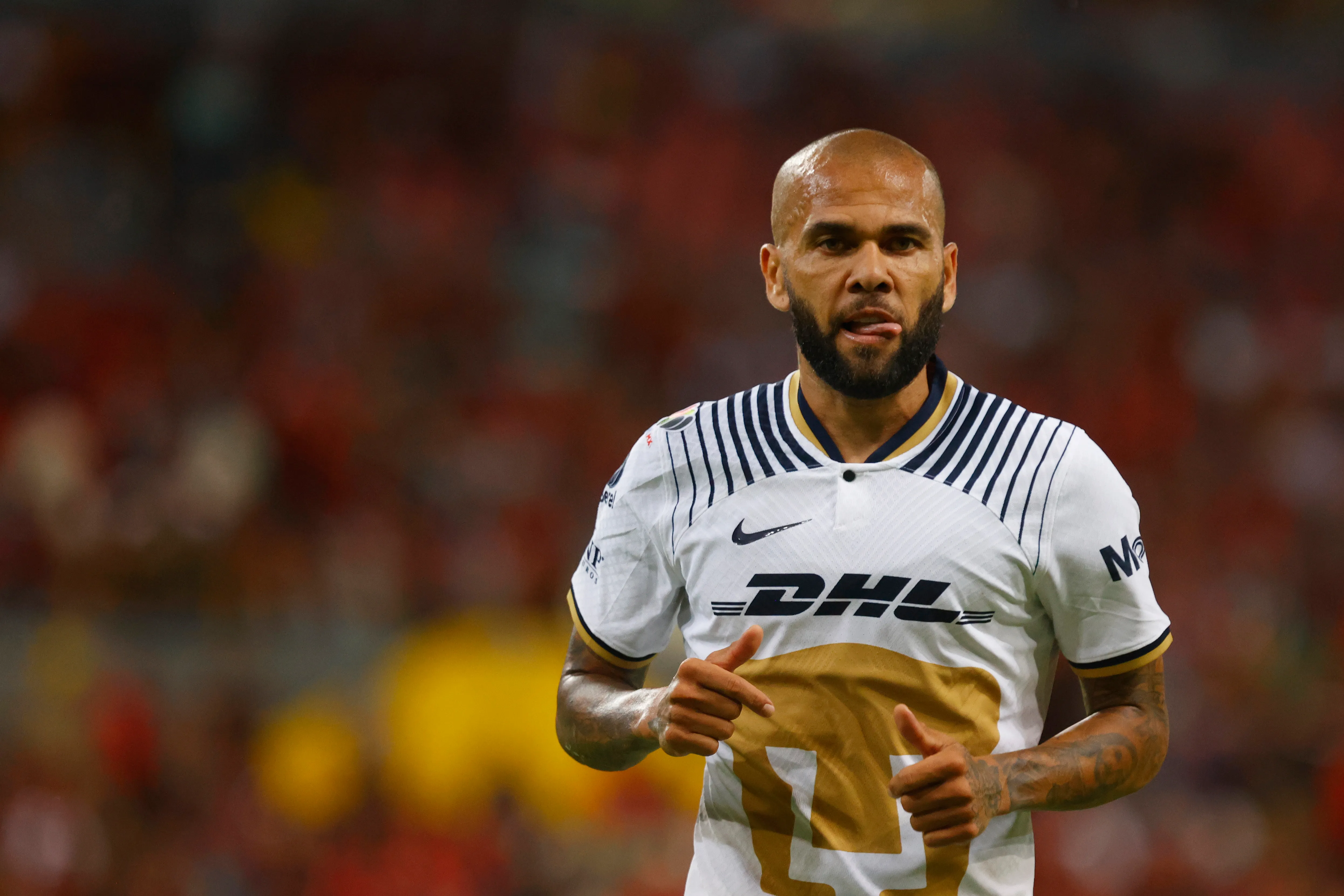 GUADALAJARA, MEXICO – SEPTEMBER 03: Dani Alves of Pumas gestures during the 12th round match between Atlas and Pumas UNAM as part of the Torneo Apertura 2022 Liga MX at Jalisco Stadium on September 3, 2022 in Guadalajara, Mexico. (Photo by Refugio Ruiz/Getty Images)