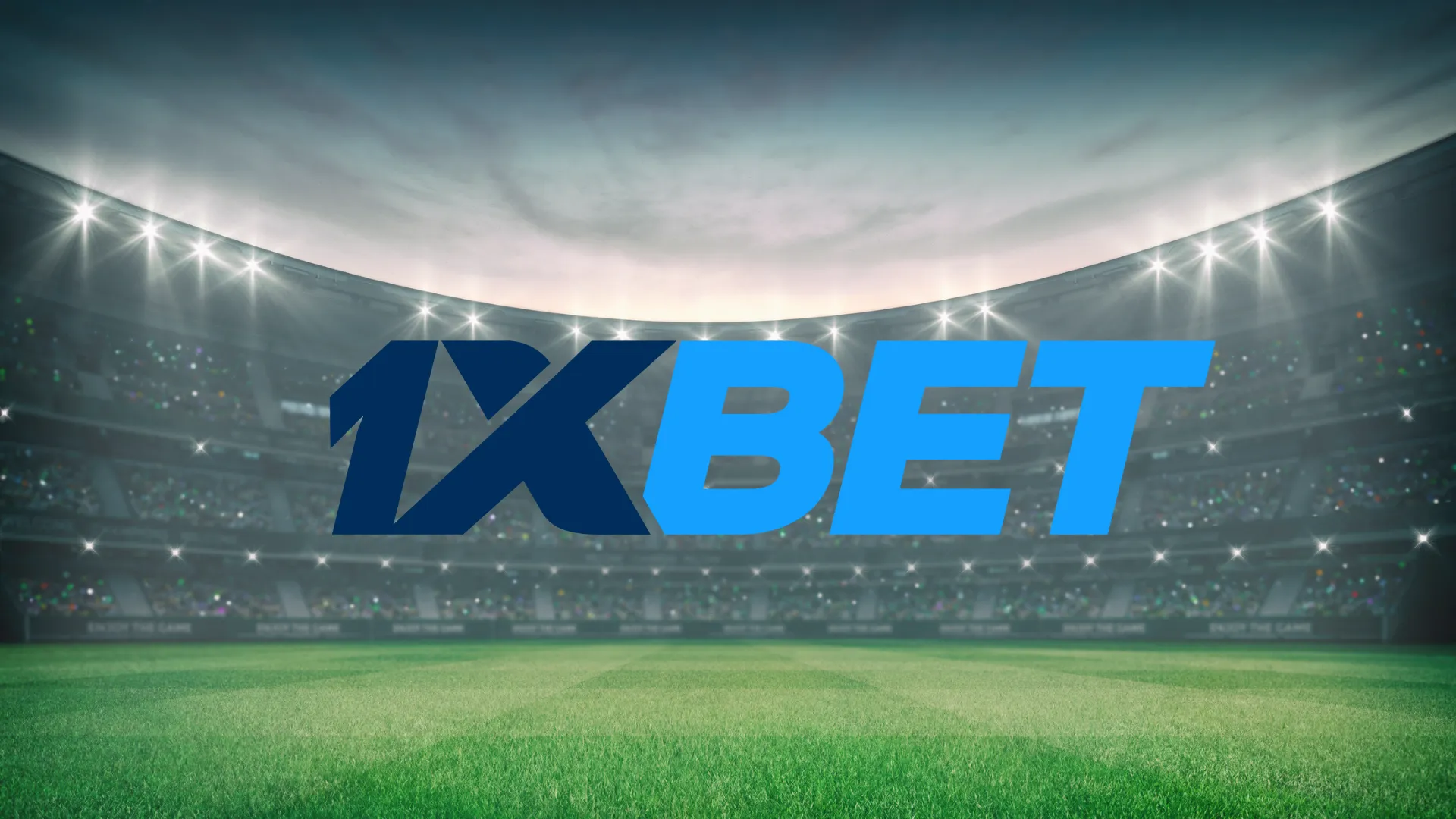 A imagem é um banner para1xBet. Diz 1xBet no centro. O fundo é uma imagem de um estádio tirada do campo. O estádio está cheio de pessoas e está iluminado. 