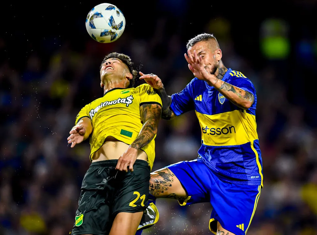 BUENOS AIRES, ARGENTINA – FEBRUARY 10: Santiago Ramos Mingo of Defensa y Justicia competes for the ball with Dario Benedetto of Boca Juniors during a Copa de la Liga 2024 group B match between Boca Juniors and Defense y Justicia at Estadio Alberto J. Armando on February 10, 2024 in Buenos Aires, Argentina. (Photo by Marcelo Endelli/Getty Images)
