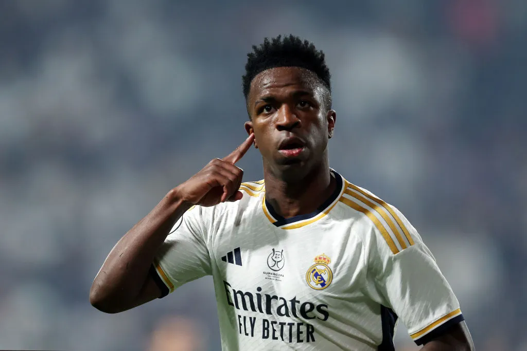 RIYADH, SAUDI ARABIA – JANUARY 14: Vinicius Junior of Real Madrid celebrates after scoring their team’s first goal during the Super Copa de España Final match between Real Madrid and FC Barcelona on January 14, 2024 in Riyadh, Saudi Arabia. (Photo by Yasser Bakhsh/Getty Images)