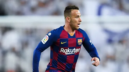 Arthur Melo of FC Barcelona runs with the ball during the Liga match between Real Madrid CF and FC Barcelona at Estadio Santiago Bernabeu on March 01, 2020 in Madrid, Spain.