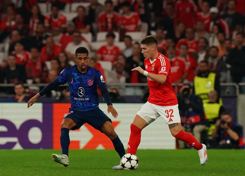 LISBON, PORTUGAL – OCTOBER 2:  Benjamin Rollheiser of SL Benfica with Samuel Lino of Atletico de Madrid in action during the UEFA Champions League 2024/25 League Phase MD2 match between SL Benfica and Atletico de Madrid at Estadio da Luz on October 2, 2024 in Lisbon, Portugal.  (Photo by Gualter Fatia/Getty Images)