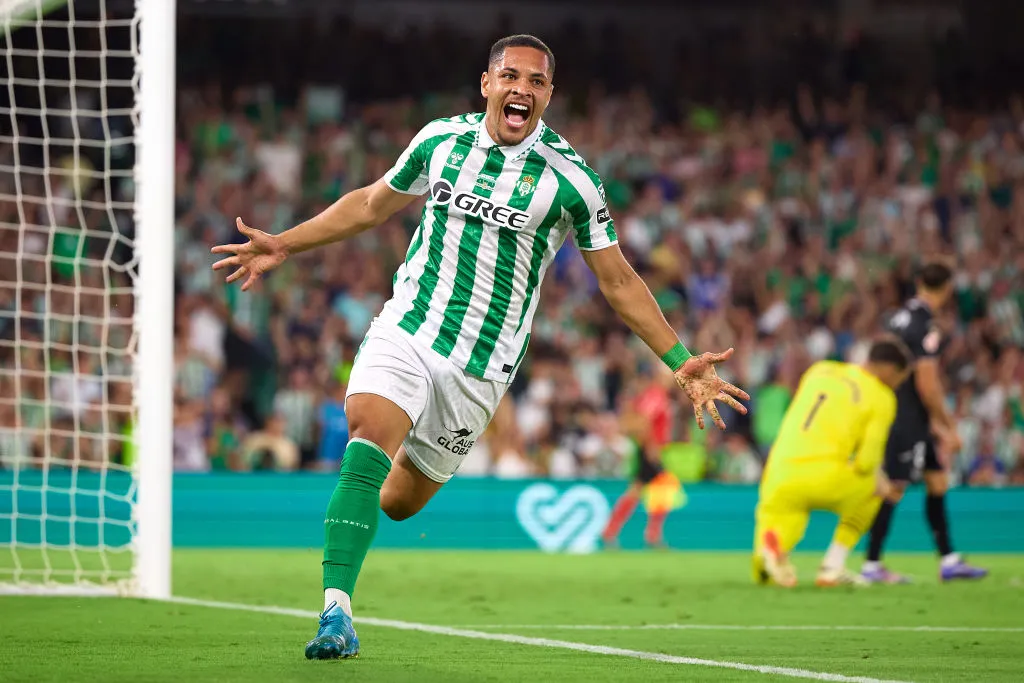SEVILLE, SPAIN – SEPTEMBER 13: Vitor Roque of Real Betis celebrates after scoring the teams second goal during the LaLiga match between Real Betis Balompie and CD Leganes  at Estadio Benito Villamarin on September 13, 2024 in Seville, Spain. (Photo by Fran Santiago/Getty Images)