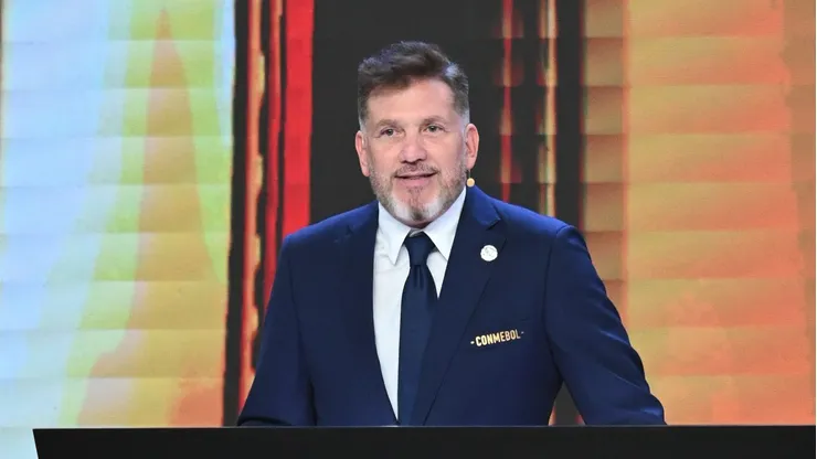 LUQUE, PARAGUAY - MARCH 17: President of CONMEBOL Alejandro Dominguez speaks during the Copa CONMEBOL Libertadores and Sudamericana 2025 draw on March 17, 2025 in Luque, Paraguay. (Photo by Christian Alvarenga/Getty Images)