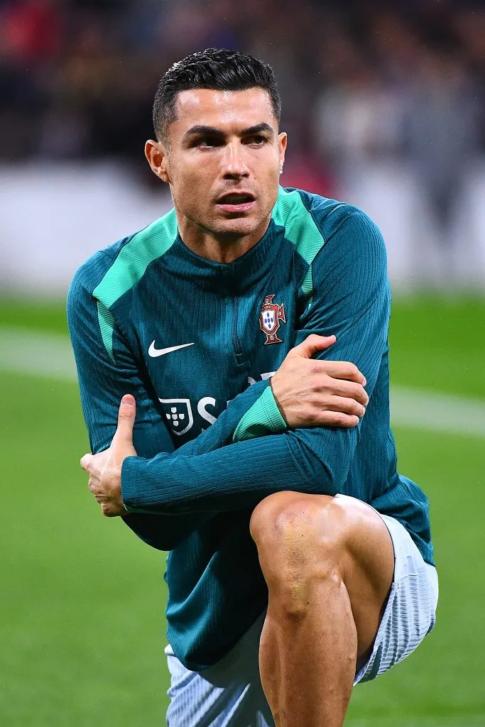 GLASGOW, SCOTLAND – OCTOBER 15: Cristiano Ronaldo of Portugal warms up prior to the UEFA Nations League 2024/25 League A Group A1 match between Scotland and Portugal at  on October 15, 2024 in Glasgow, Scotland. (Photo by Euan Cherry/Getty Images)