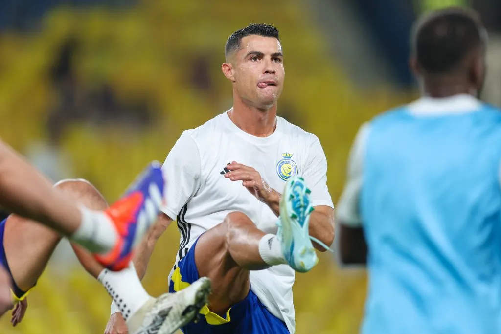 RIYADH, SAUDI ARABIA – AUGUST 22: Cristiano Ronaldo of Al Nassr warming up before the Saudi Pro League match between Al Nassr and Al Raed at Al Awwal Park Stadium on August 22, 2024 in Riyadh, Saudi Arabia. (Photo by Yasser Bakhsh/Getty Images)
