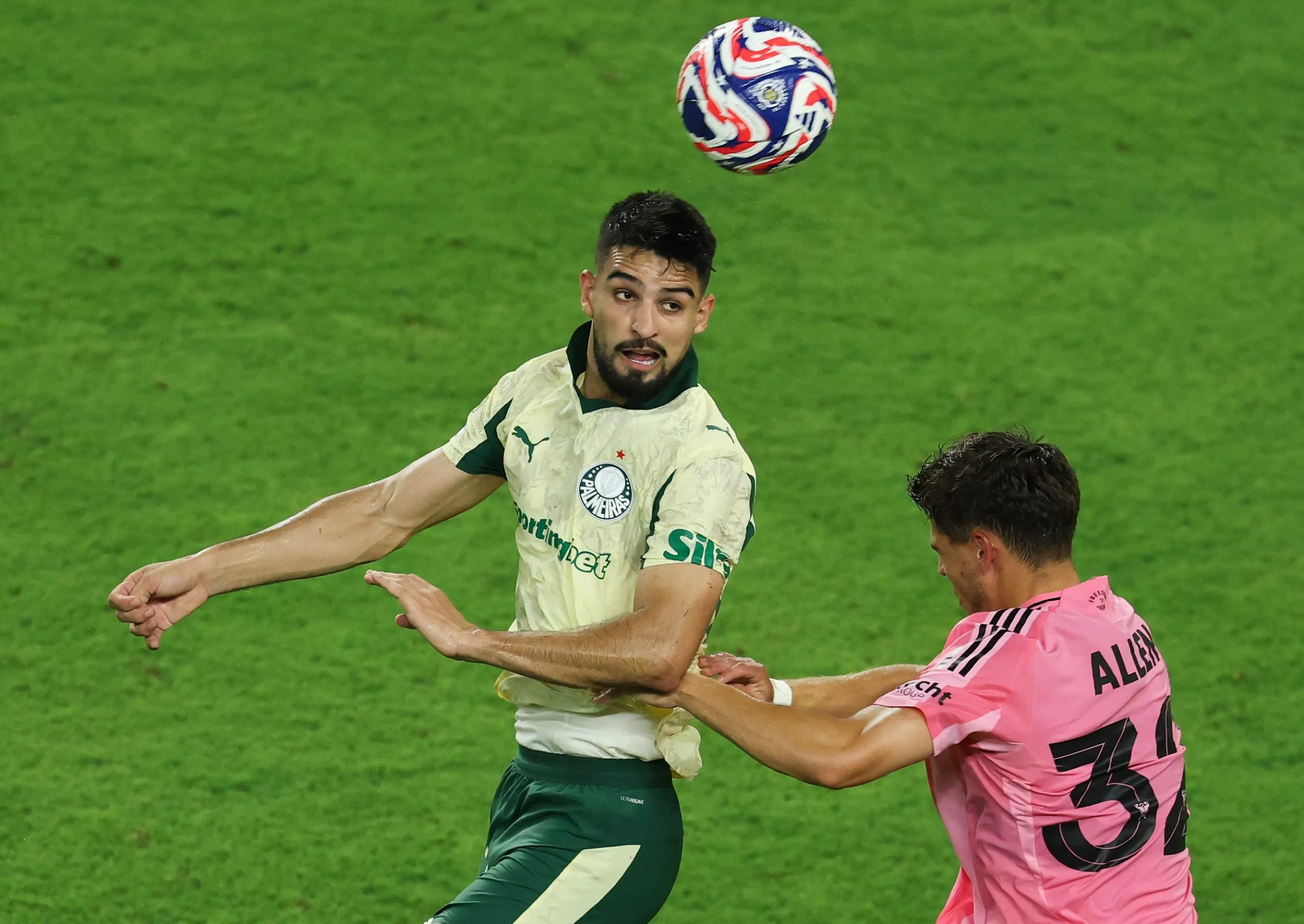 MIAMI GARDENS, FLORIDA – JUNE 23: Jose Manuel Lopez #42 of Palmeiras wins a header against Noah Allen #32 of Inter Miami CF during the FIFA Club World Cup 2025 group A match between Internacional CF Miami and SE Palmeiras at Hard Rock Stadium on June 23, 2025 in Miami Gardens, Florida. (Photo by Dan Mullan/Getty Images)