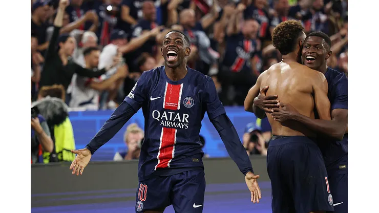 MUNICH, GERMANY - MAY 31: Ousmane Dembele of Paris Saint-Germain celebrates after Desire Doue of Paris Saint-Germain scores his team's third goal during the UEFA Champions League Final 2025 between Paris Saint-Germain and FC Internazionale Milano at Munich Football Arena on May 31, 2025 in Munich, Germany. (Photo by Lars Baron/Getty Images)