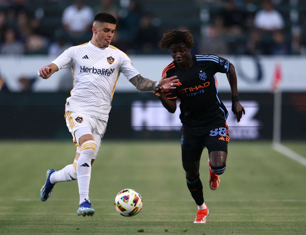 CARSON, CALIFORNIA – JUNE 19: Malachi Jones #88 of New York City FC attempts to dribble away from Gabriel Pec #11 of Los Angeles Galaxy during a 2-0 loss to the Los Angeles Galaxy at Dignity Health Sports Park on June 19, 2024 in Carson, California. (Photo by Harry How/Getty Images)
