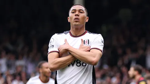 Carlos Vinicius of Fulham celebrates after scoring the team's first goal during the Premier League match between Fulham FC and Manchester City at Craven Cottage on April 30, 2023 in London, England.