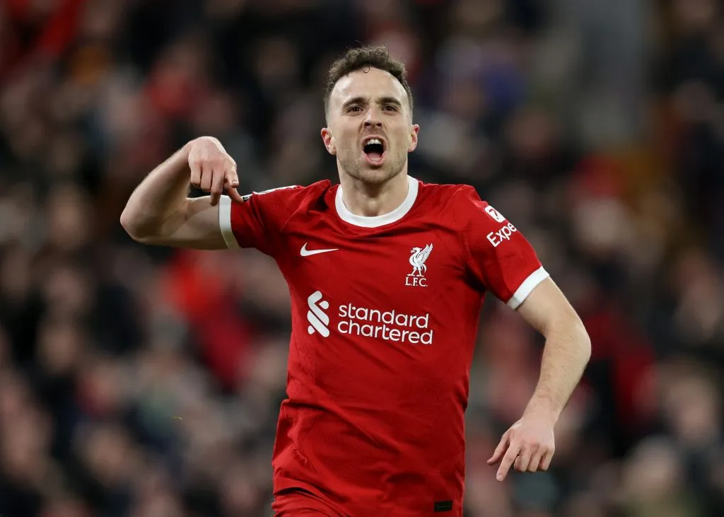 LIVERPOOL, ENGLAND – JANUARY 31: Diogo Jota of Liverpool celebrates scoring his team’s first goal during the Premier League match between Liverpool FC and Chelsea FC at Anfield on January 31, 2024 in Liverpool, England. (Photo by Clive Brunskill/Getty Images)