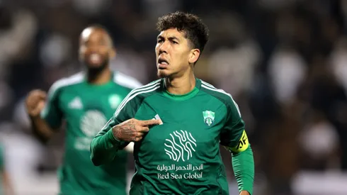 DOHA, QATAR – FEBRUARY 03: Roberto Firmino of Al-Ahli Saudi celebrates scoring his team's first goal during the AFC Champions League Elite match between Al-Sadd and Al-Ahli at Jassim bin Hamad Stadium on February 03, 2025 in Doha, Qatar. (Photo by Mohamed Farag/Getty Images)