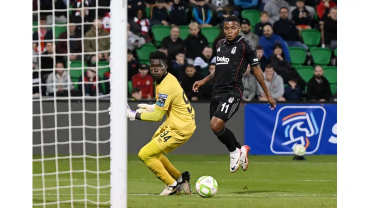 TALLAGHT, IRELAND - AUGUST 07: Keny Arroyo of Besiktas takes a shot as Joseph Anang of St Patrick's Athletic reacts during the UEFA Conference Third Qualifying Round Second Leg match between St Patrick's and Besiktas at Tallaght Stadium on August 07, 2025 in Tallaght, Ireland. (Photo by Charles McQuillan/Getty Images)