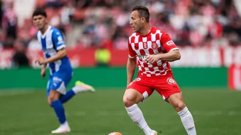 Arthur Melo of Girona FC runs with the ball during the LaLiga match between Girona FC and Deportivo Alaves at Montilivi Stadium on April 05, 2025 in Girona, Spain.