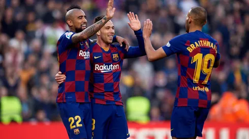 BARCELONA, SPAIN – FEBRUARY 22: Arthur Melo of FC Barcelona celebrates scoring his team's fifth goal with his teammates Arturo Vidal and Martin Braithwaite during the La Liga match between FC Barcelona and SD Eibar SAD at Camp Nou on February 22, 2020 in Barcelona, Spain. (Photo by Alex Caparros/Getty Images)