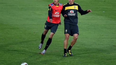 JOHANNESBURG, SOUTH AFRICA - JUNE 03: Nilmar (L) and Lucio battle for the ball during the Brazil Training session at Dobsonville Stadium in Soweto on June 3, 2010 in Johannesburg, South Africa. The Brazil national team are in South Africa to contest the 2010 FIFA World Cup. (Photo by Richard Heathcote/Getty Images)