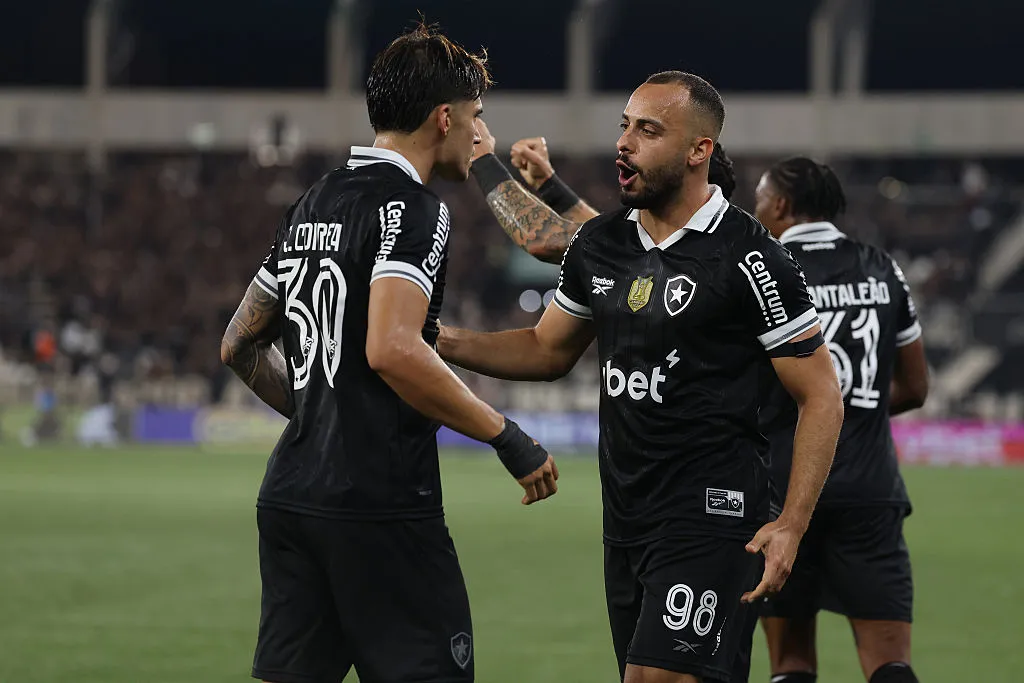 RIO DE JANEIRO, BRAZIL – JULY 26: Arthur Cabral of Botafogo celebrates with Joaquín Correa after scoring the first goal of his team during the match between Botafogo and Corinthians as part of Brasileirao 2025 at Estadio Olimpico Nilton Santos on July 26, 2025 in Rio de Janeiro, Brazil. (Photo by Wagner Meier/Getty Images)