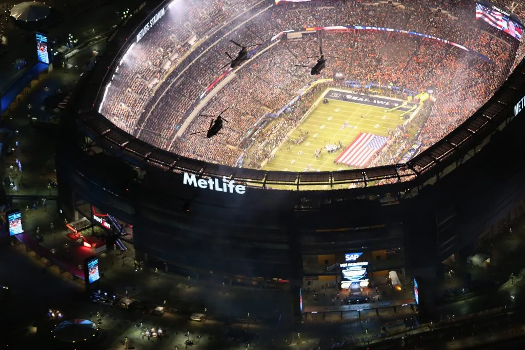 EAST RUTHERFORD, NJ – FEBRUARY 02:  U.S. Army helicopters from the 101st Combat Aviation Brigade fly over Metlife Stadium ahead of Super Bowl XLVIII between the Seattle Seahawks and the Denver Broncos on February 2, 2014 in East Rutherford, New Jersey. The Seahawks won 43-8. The view is seen from a Customs and Border Protection helicopter operated by the U.S. Office of Air and Marine, which provided air support for law enforcement on the ground around the stadium.  (Photo by John Moore/Getty Images)