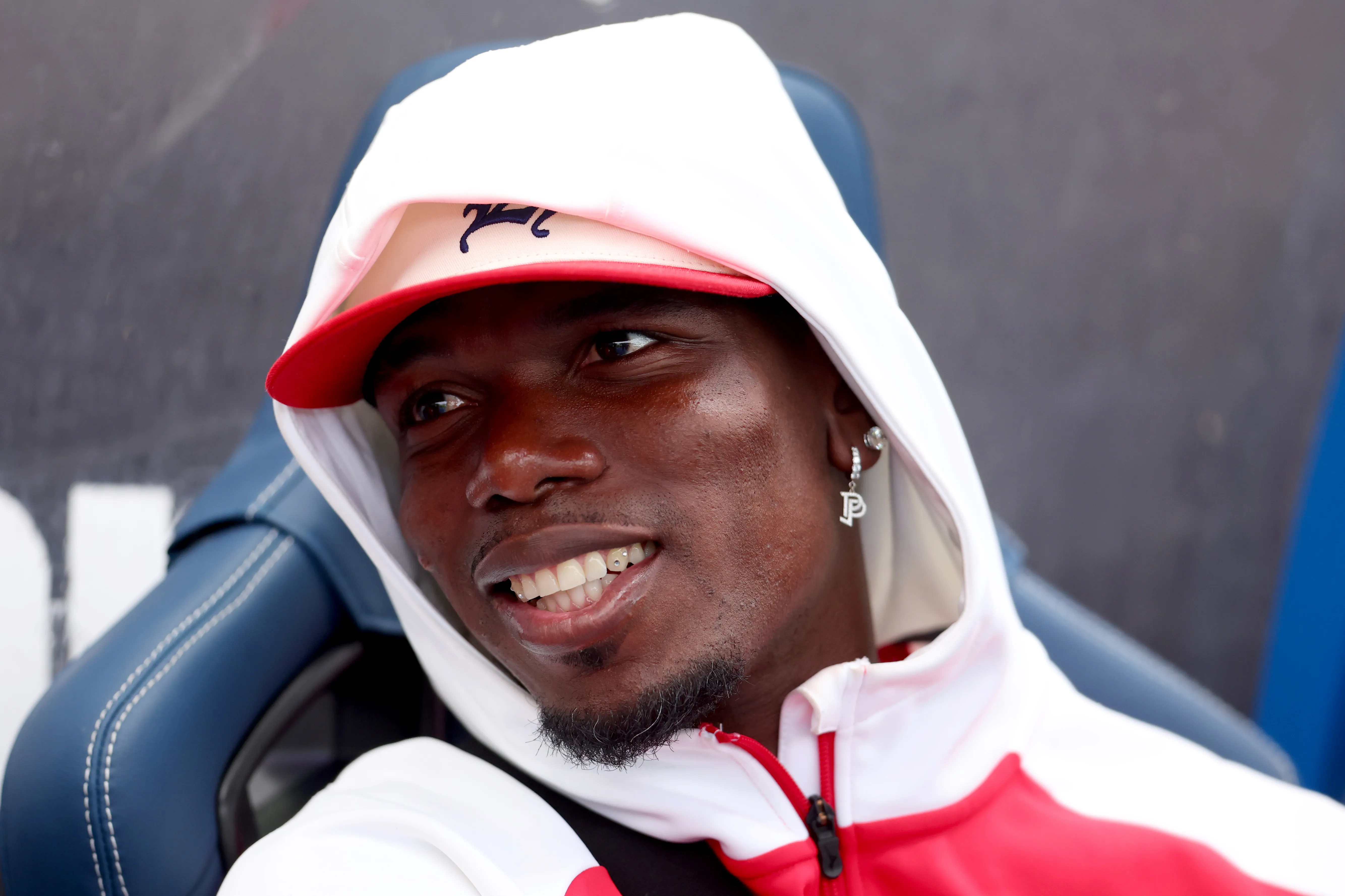 CHESTERFIELD, ENGLAND – JULY 19: Paul Pogba of AS Monaco in the dugout ahead of the pre-season friendly match between Nottingham Forest and AS Monaco at SMH Group Stadium on July 19, 2025 in Chesterfield, England. (Photo by Ed Sykes/Getty Images)