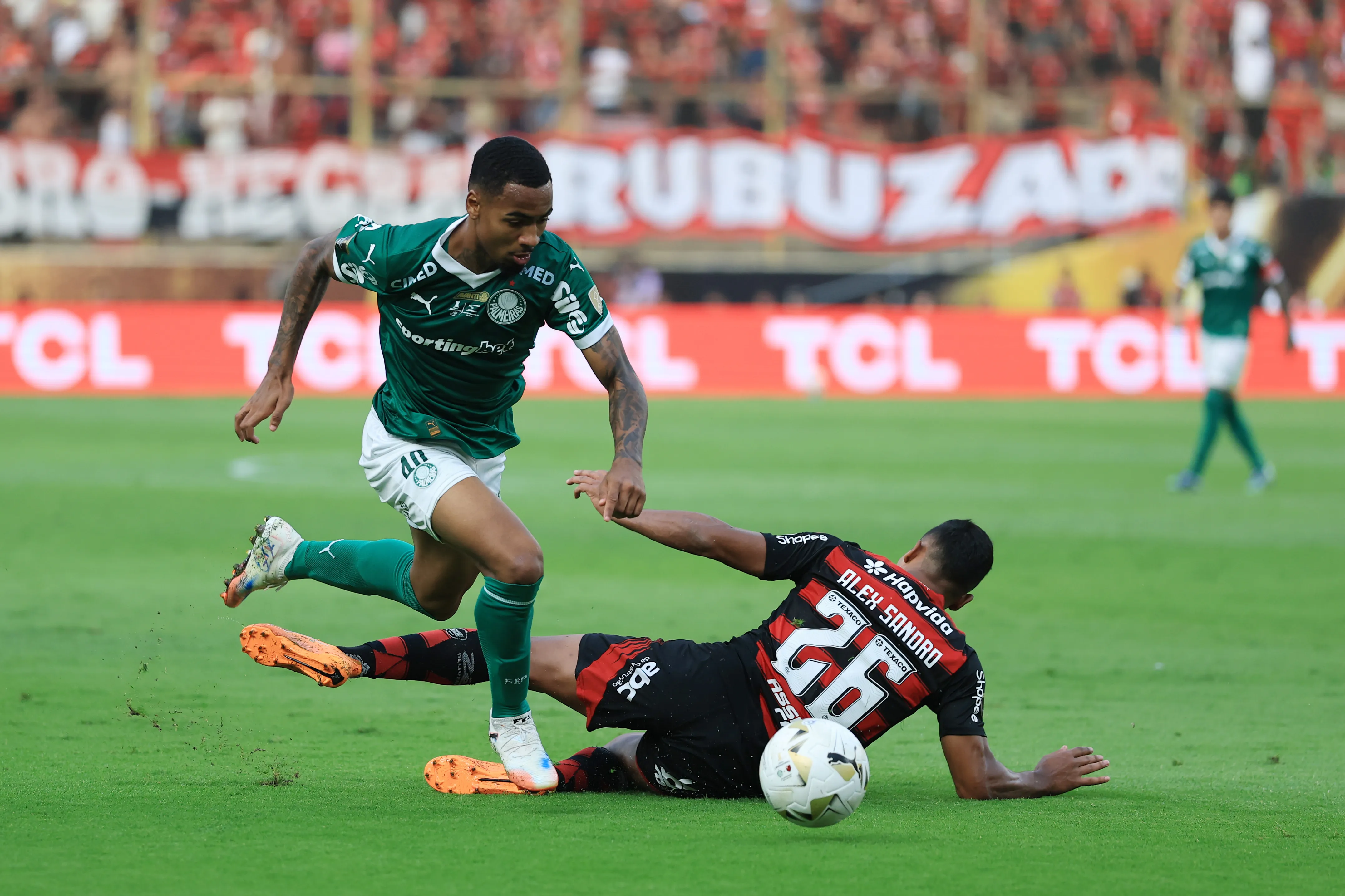 LIMA, PERU – NOVEMBER 29: Allan of Palmeiras is challenged by Alex Sandro of Flamengo during the 2025 Copa CONMEBOL Libertadores Final match between Palmeiras and Flamengo at Estadio Monumental on November 29, 2025 in Lima, Peru.  (Photo by Buda Mendes/Getty Images)