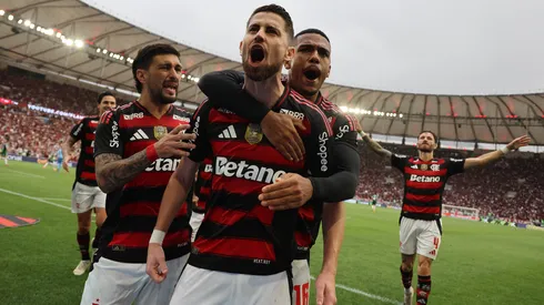 : Jorginho of Flamengo celebrates with Giorgian de Arrascaeta, Samuel Lino after scoring the second goal of his team during the match between Flamengo and Palmeiras as part of Brasileirao 2025 at Maracana Stadium on October 19, 2025 in Rio de Janeiro, Brazil. (Photo by Wagner Meier/Getty Images)