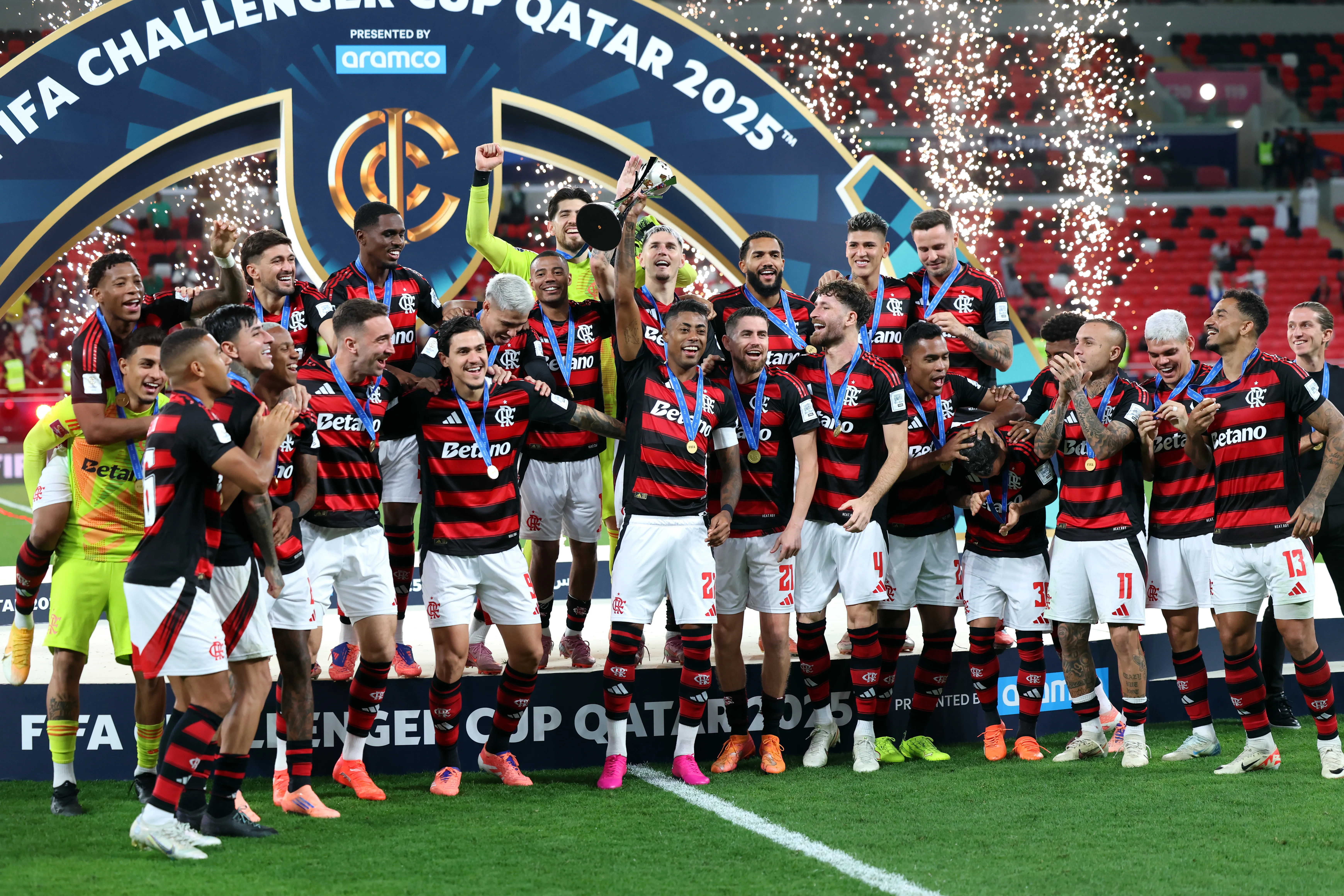 DOHA, QATAR – DECEMBER 13: Bruno Henrique of CR Flamengo lifts the trophy after winning the FIFA Challenger Cup 2025 match between CR Flamengo and Pyramids FC at Ahmad Bin Ali Stadium on December 13, 2025 in Doha, Qatar. (Photo by Getty Images/Getty Images)