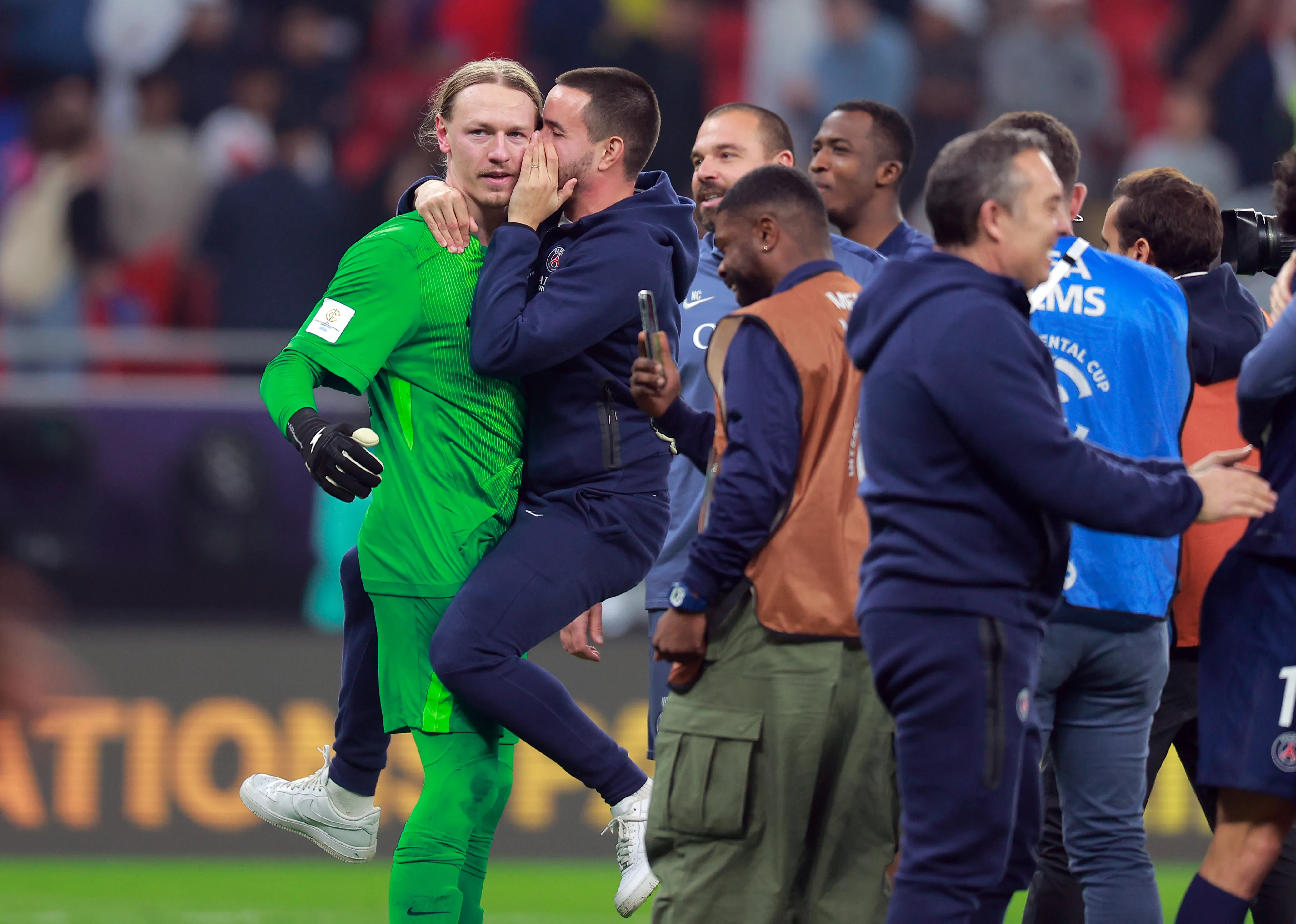 DOHA, QATAR – DECEMBER 17: Matvey Safonov of Paris Saint-Germain is mobbed his teammates after they win the penalty shoot out during the FIFA Intercontinental Cup 2025 final match between Paris Saint-Germain and CR Flamengo at Ahmad Bin Ali Stadium on December 17, 2025 in Doha, Qatar.  (Photo by Getty Images/Getty Images)