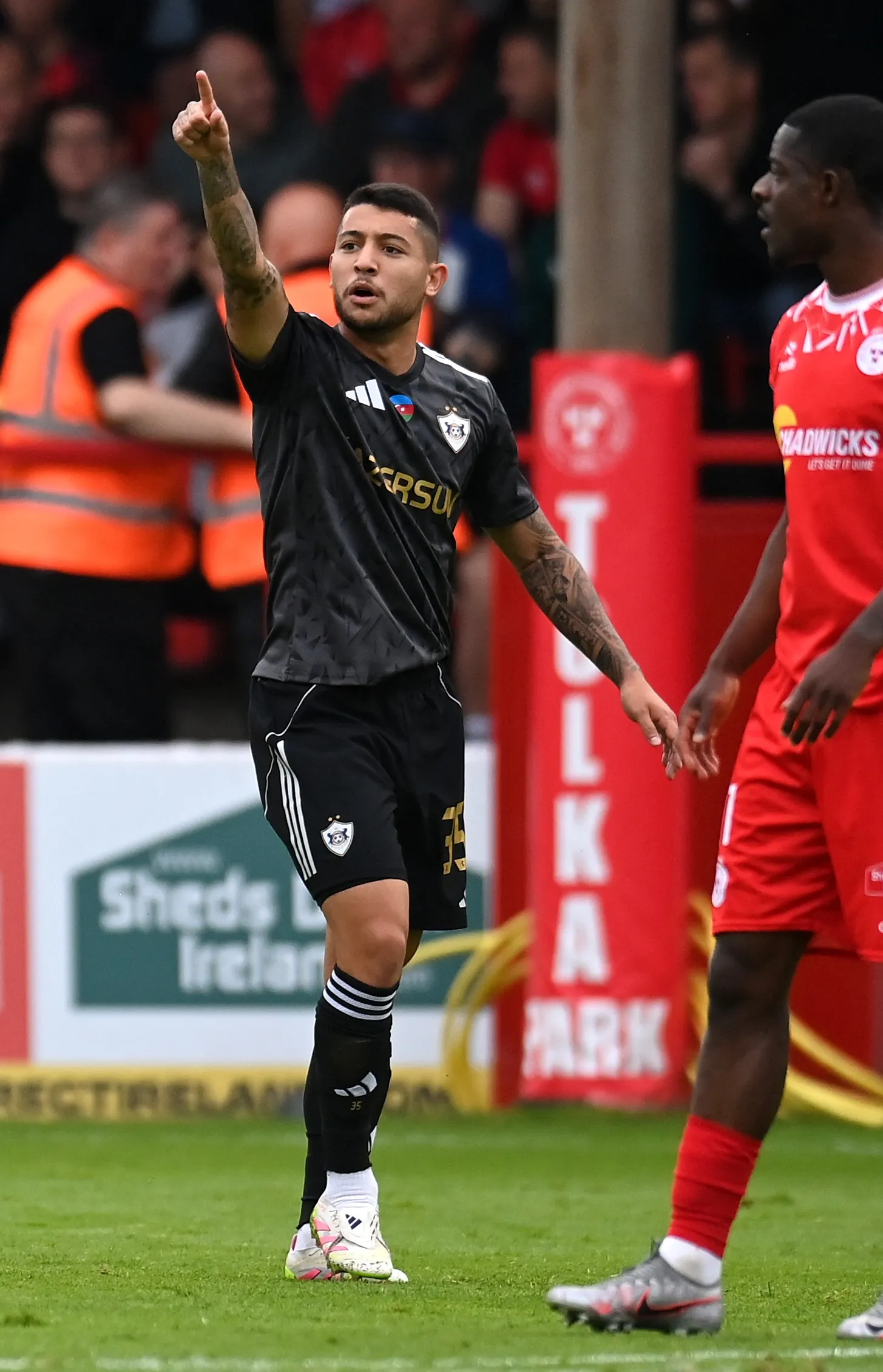 DUBLIN, IRELAND – JULY 23: Leandro Andrade of Qarabag celebrates scoring his team’s first goal with teammate Pedro Bicalho during the UEFA Champions League Second Qualifying Round First Leg match between Shelbourne and Qarabag at Tolka Park on July 23, 2025 in Dublin, Ireland.  (Photo by Charles McQuillan/Getty Images)
