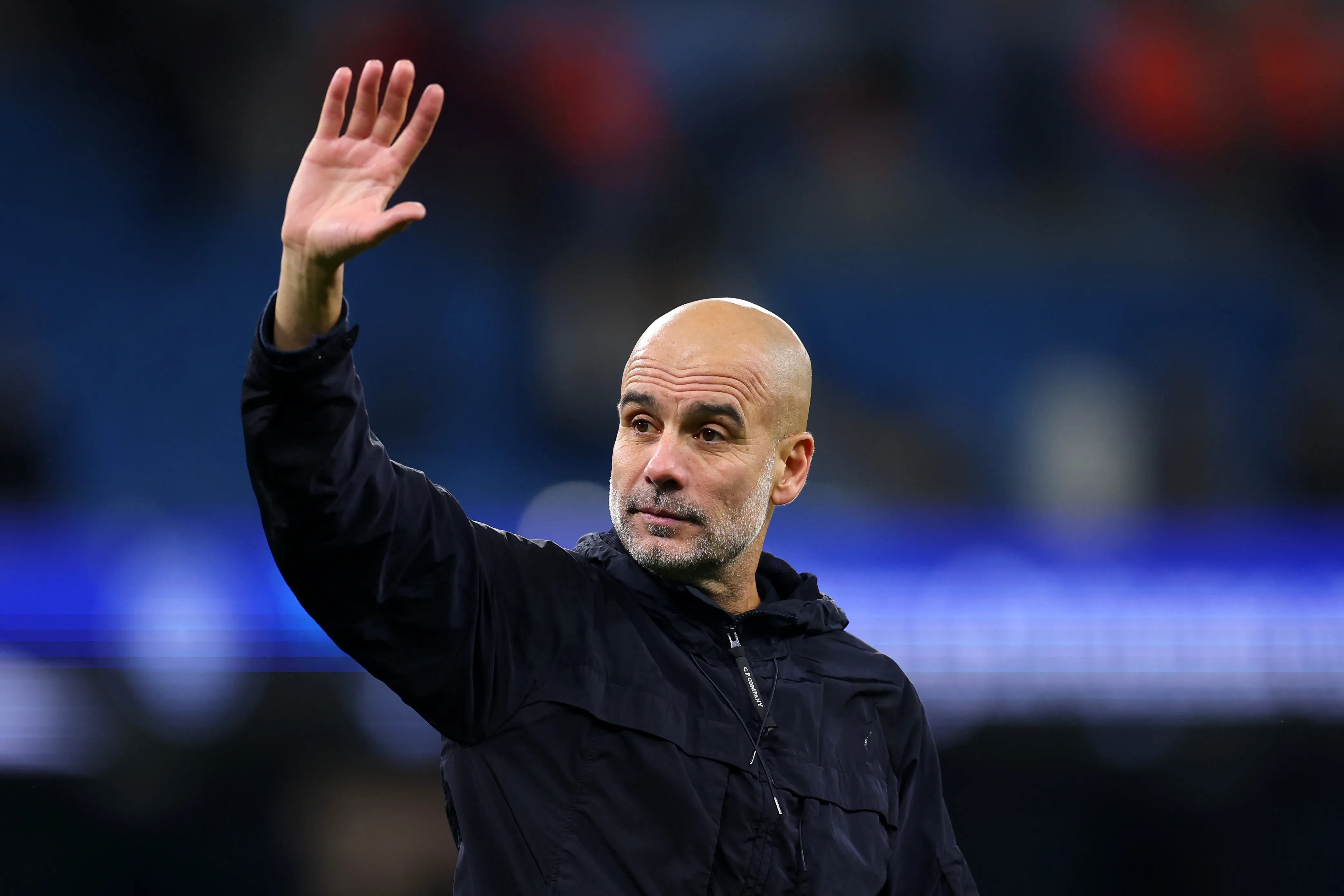 MANCHESTER, ENGLAND – DECEMBER 20: Pep Guardiola, Manager of Manchester City, waves to the fans after victory in the Premier League match between Manchester City and West Ham United at Etihad Stadium on December 20, 2025 in Manchester, England. (Photo by Molly Darlington/Getty Images)