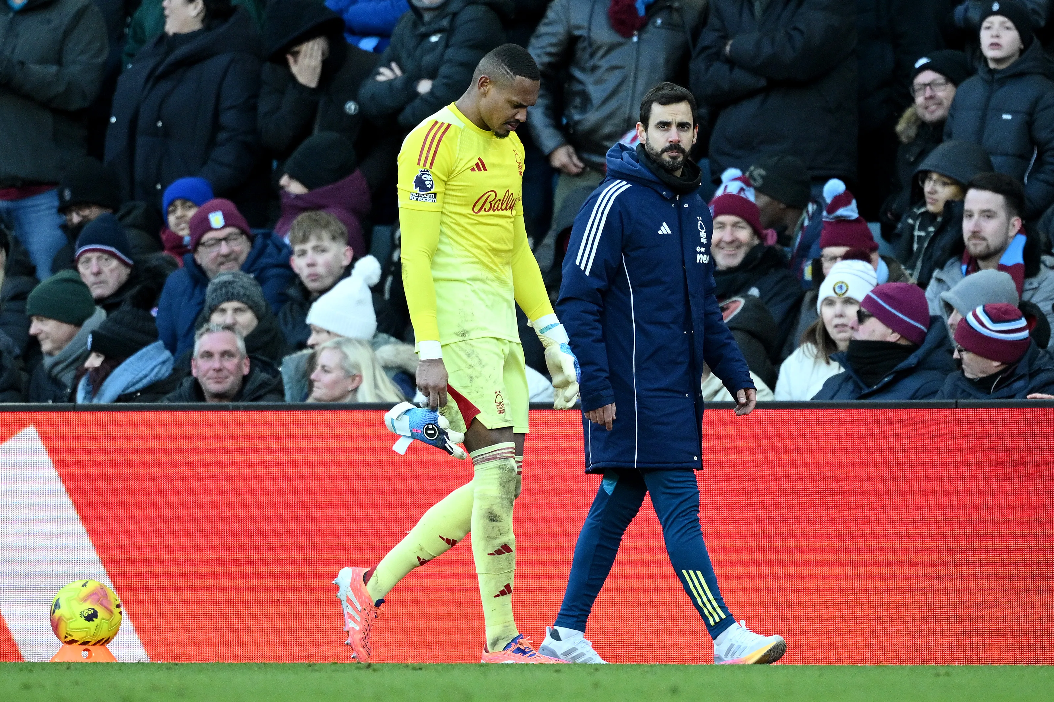 BIRMINGHAM, ENGLAND – JANUARY 03: John Victor of Nottingham Forest leaves the field after receiving medical treatment during the Premier League match between Aston Villa and Nottingham Forest at Villa Park on January 03, 2026 in Birmingham, England. (Photo by Clive Mason/Getty Images)