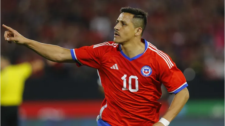 Alexis Sanchez of Chile celebrates after scoring the second goal of his team during an international friendly match against Paraguay at Estadio Monumental David Arellano on March 27, 2023 in Santiago, Chile. (Photo by Marcelo Hernandez/Getty Images)