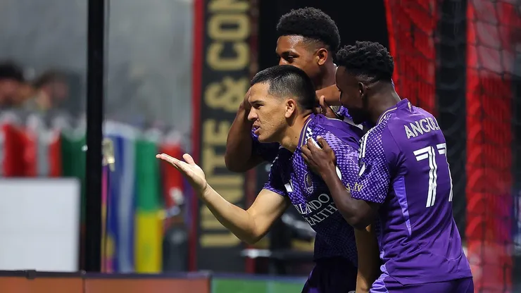 ATLANTA, GEORGIA - MAY 28: César Araújo #5 of Orlando City reacts with Alex Freeman #30 and Iván Angulo #77 after scoring the first goal against Atlanta United during the first half at Mercedes-Benz Stadium on May 28, 2025 in Atlanta, Georgia. (Photo by Kevin C. Cox/Getty Images)