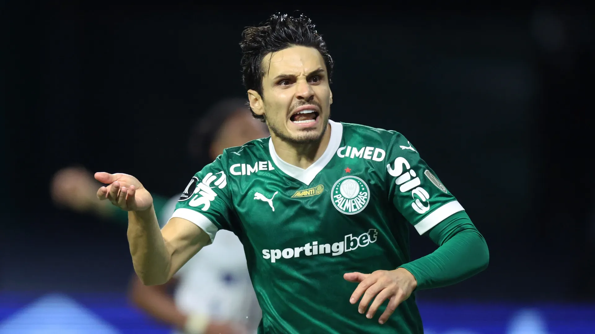 Raphael Veiga of Palmeiras celebrates after scoring the team’s fourth goal via penalty during the Copa CONMEBOL Libertadores 2025 semi-final second leg match between Palmeiras and LDU Quito at Allianz Parque on October 30, 2025 in Sao Paulo, Brazil. (Photo by Alexandre Schneider/Getty Images)