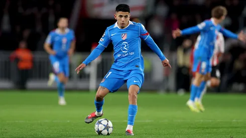 Thiago Almada of Atletico de Madrid runs with the ball during the UEFA Champions League 2025/26 League Phase MD6 match between PSV Eindhoven and Atletico de Madrid at PSV Stadion on December 09, 2025 in Eindhoven, Netherlands.