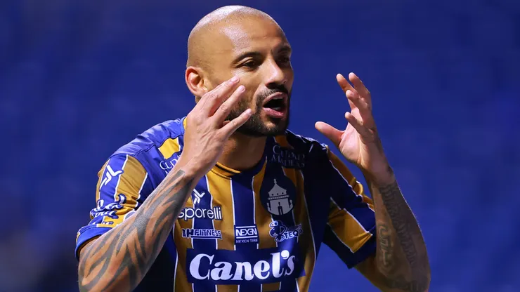 Joao Pedro of Atletico San Luis celebrates scoring his team's first goal during the 5th round match between Puebla and Atletico San Luis as part of the Torneo Apertura 2025 Liga MX at Cuauhtemoc Stadium on August 15, 2025 in Puebla, Mexico.