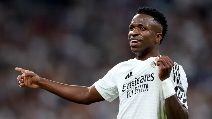 Vinicius Junior of Real Madrid celebrates scoring his team's third goal during the LaLiga match between Real Madrid CF and RCD Espanyol de Barcelona at Estadio Santiago Bernabeu on September 21, 2024 in Madrid, Spain. (Photo by Florencia Tan Jun/Getty Images)