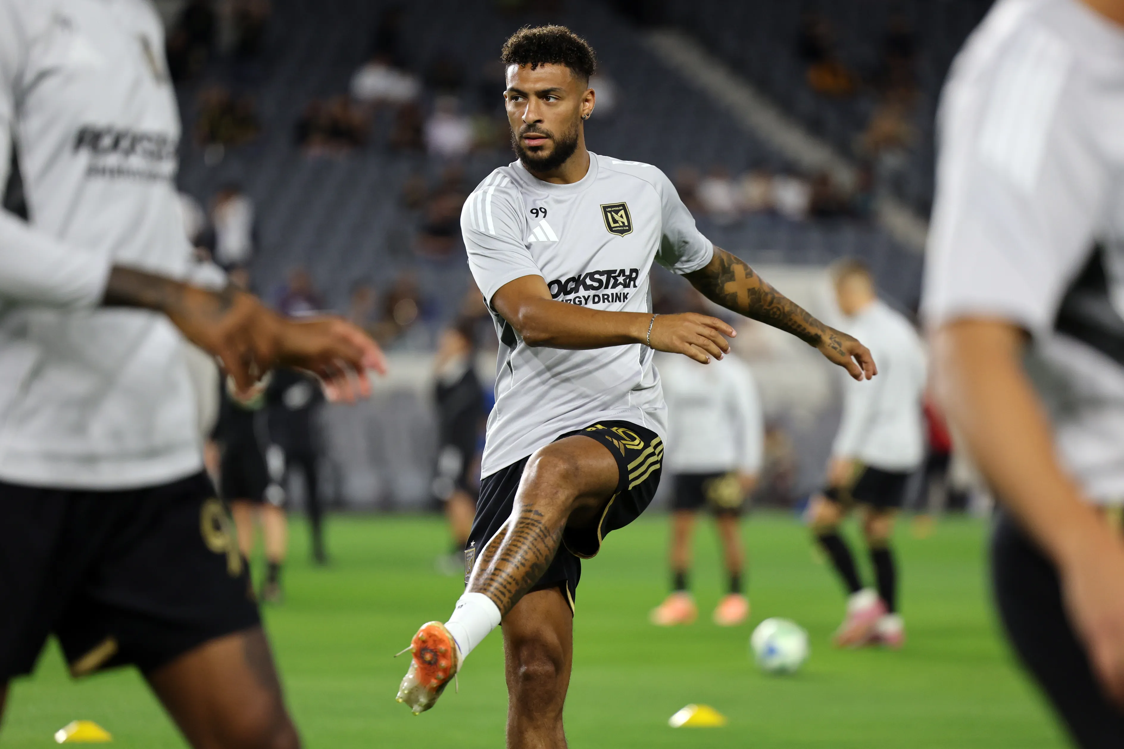 LOS ANGELES, CALIFORNIA – OCTOBER 29: Denis Bouanga #99 of LAFC warms up before 2025 MLS Cup Playoffs game against Austin FC at BMO Stadium on October 29, 2025 in Los Angeles, California. (Photo by Kevork Djansezian/Getty Images)