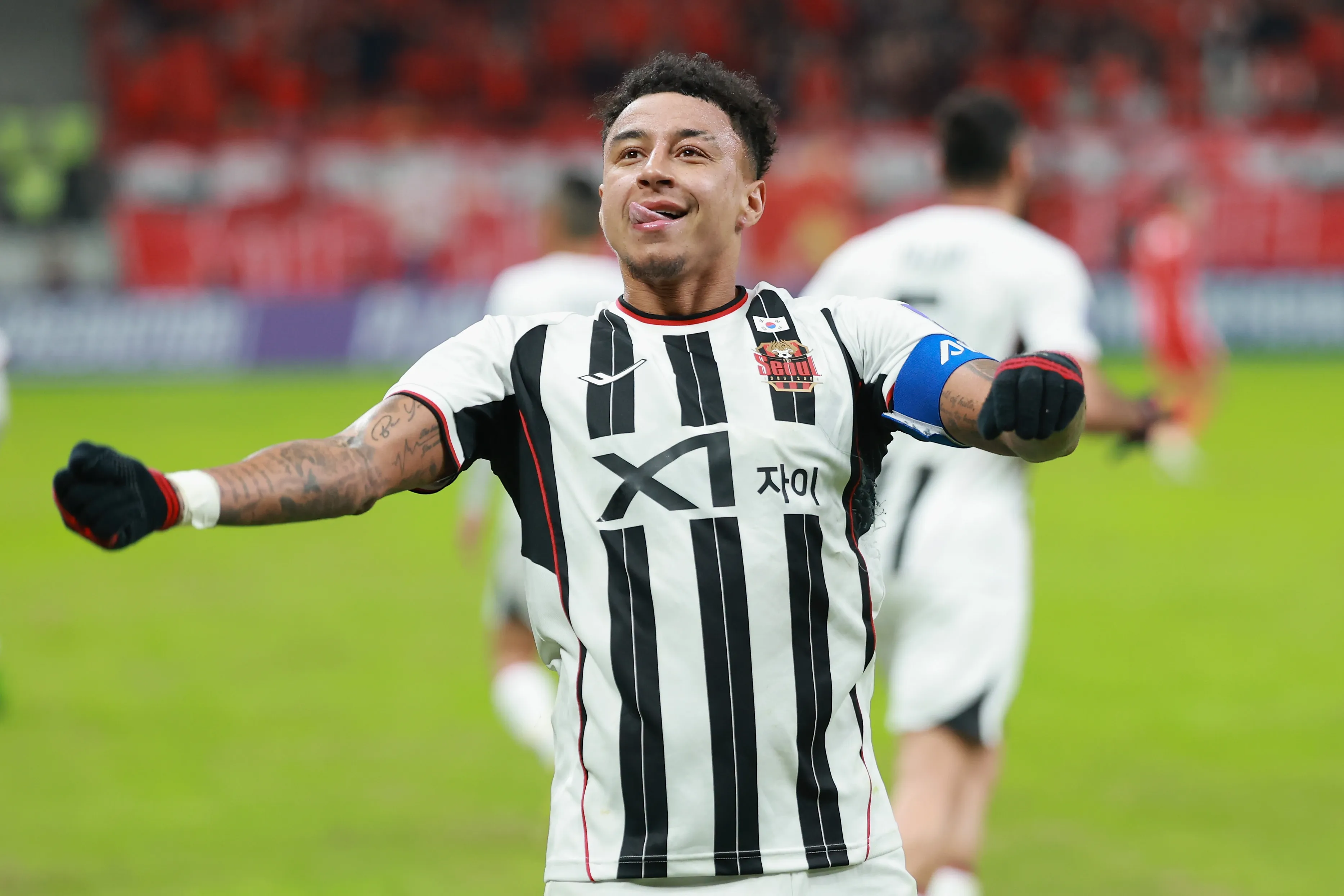 SHANGHAI, CHINA – NOVEMBER 25: Jesse Lingard #10 of FC Seoul celebrating his second goal and the team’s third goal during the AFC Champions League Elite 2025-26 East Region Group Stage match between Shanghai Port and FC Seoul at Pudong Football Stadium on November 25, 2025 in Shanghai, China. (Photo by Lintao Zhang/Getty Images)