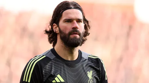 Alisson Becker of Liverpool looks on during the Premier League match between Liverpool and Tottenham Hotspur at Anfield on March 15, 2026 in Liverpool, England.