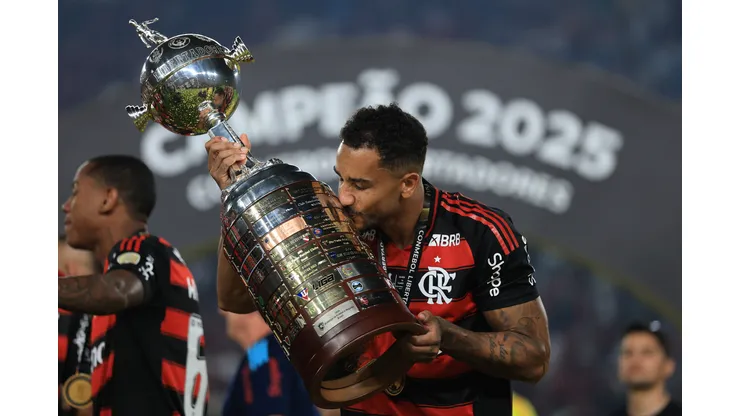Danilo of Flamengo celebrates with the trophy after winning the 2025 Copa CONMEBOL Libertadores Final match between Palmeiras and Flamengo at Estadio Monumental on November 29, 2025 in Lima, Peru. (Photo by Buda Mendes/Getty Images)