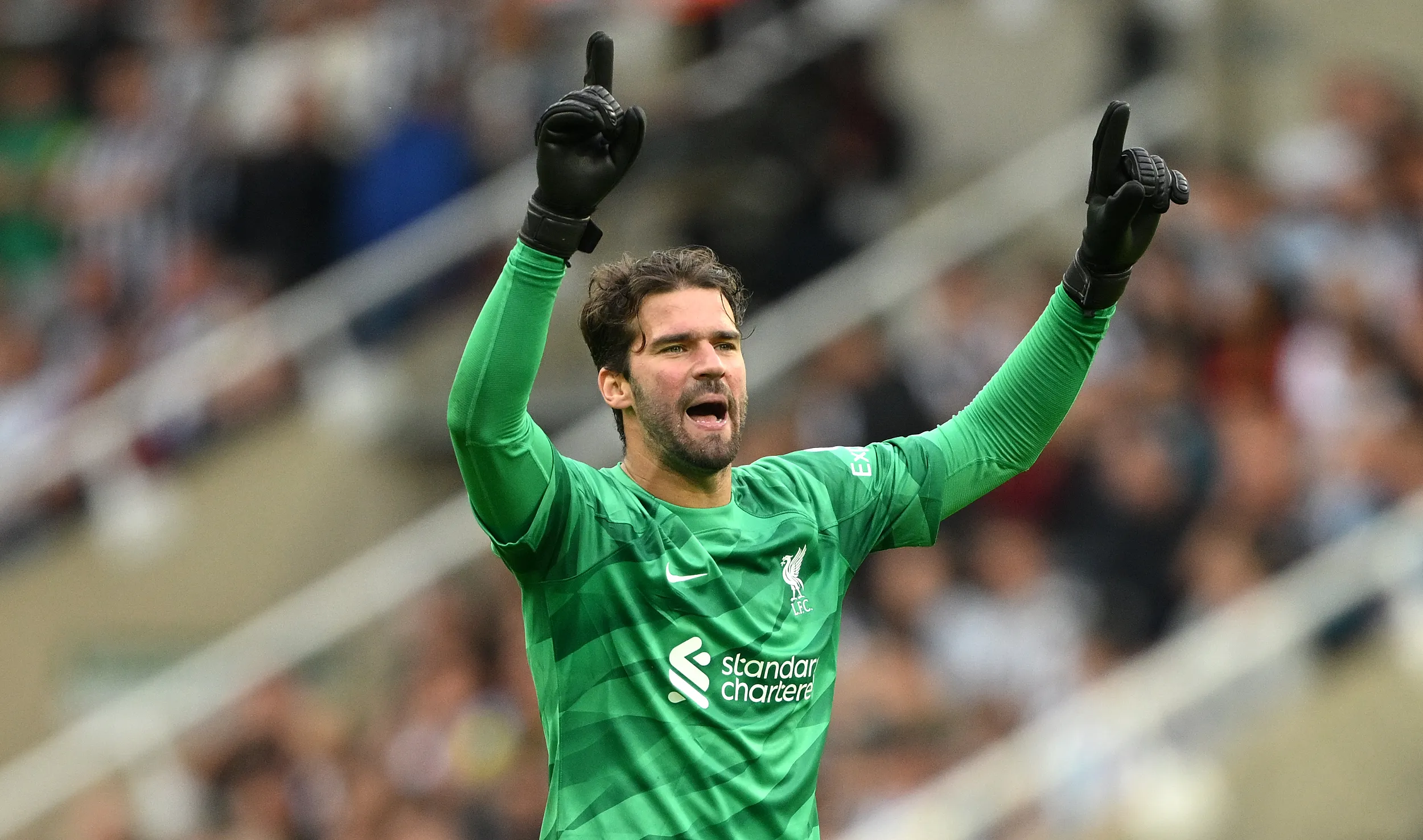 NEWCASTLE UPON TYNE, ENGLAND – AUGUST 27: Liverpool goalkeeper Alisson Becker celebrates the second Liverpool goal during the Premier League match between Newcastle United and Liverpool FC at St. James Park on August 27, 2023 in Newcastle upon Tyne, England. (Photo by Stu Forster/Getty Images)