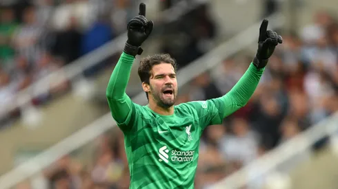 NEWCASTLE UPON TYNE, ENGLAND - AUGUST 27: Liverpool goalkeeper Alisson Becker celebrates the second Liverpool goal during the Premier League match between Newcastle United and Liverpool FC at St. James Park on August 27, 2023 in Newcastle upon Tyne, England. (Photo by Stu Forster/Getty Images)