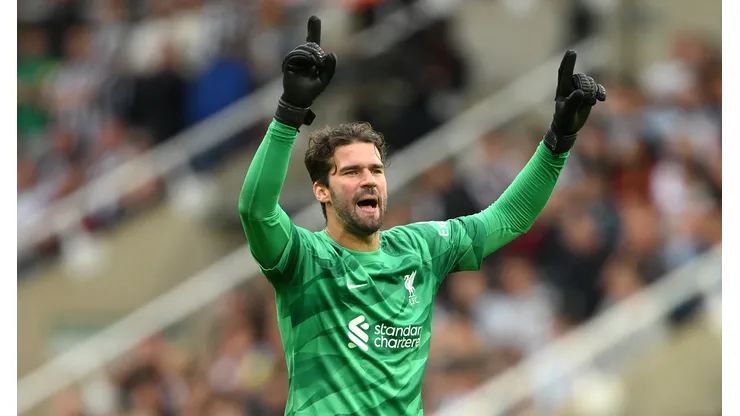 NEWCASTLE UPON TYNE, ENGLAND - AUGUST 27: Liverpool goalkeeper Alisson Becker celebrates the second Liverpool goal during the Premier League match between Newcastle United and Liverpool FC at St. James Park on August 27, 2023 in Newcastle upon Tyne, England. (Photo by Stu Forster/Getty Images)