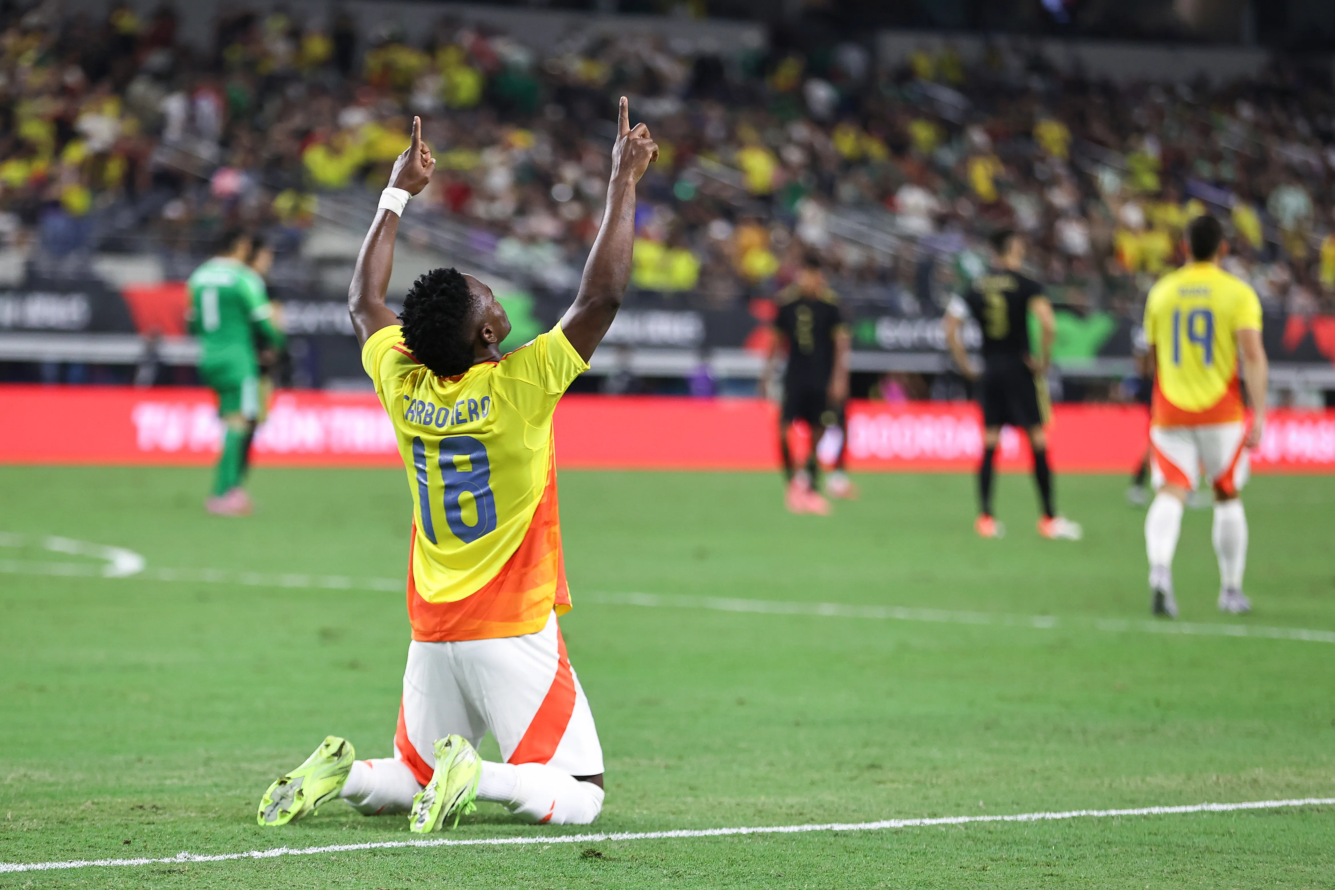 ARLINGTON, TEXAS – OCTOBER 11: Johan Carbonero #18 of Colombia celebrates after scoring the fourth goal of his team during an international friendly match between Mexico and Colombia at AT&amp;T Stadium on October 11, 2025 in Arlington, Texas. (Photo by Omar Vega/Getty Images)